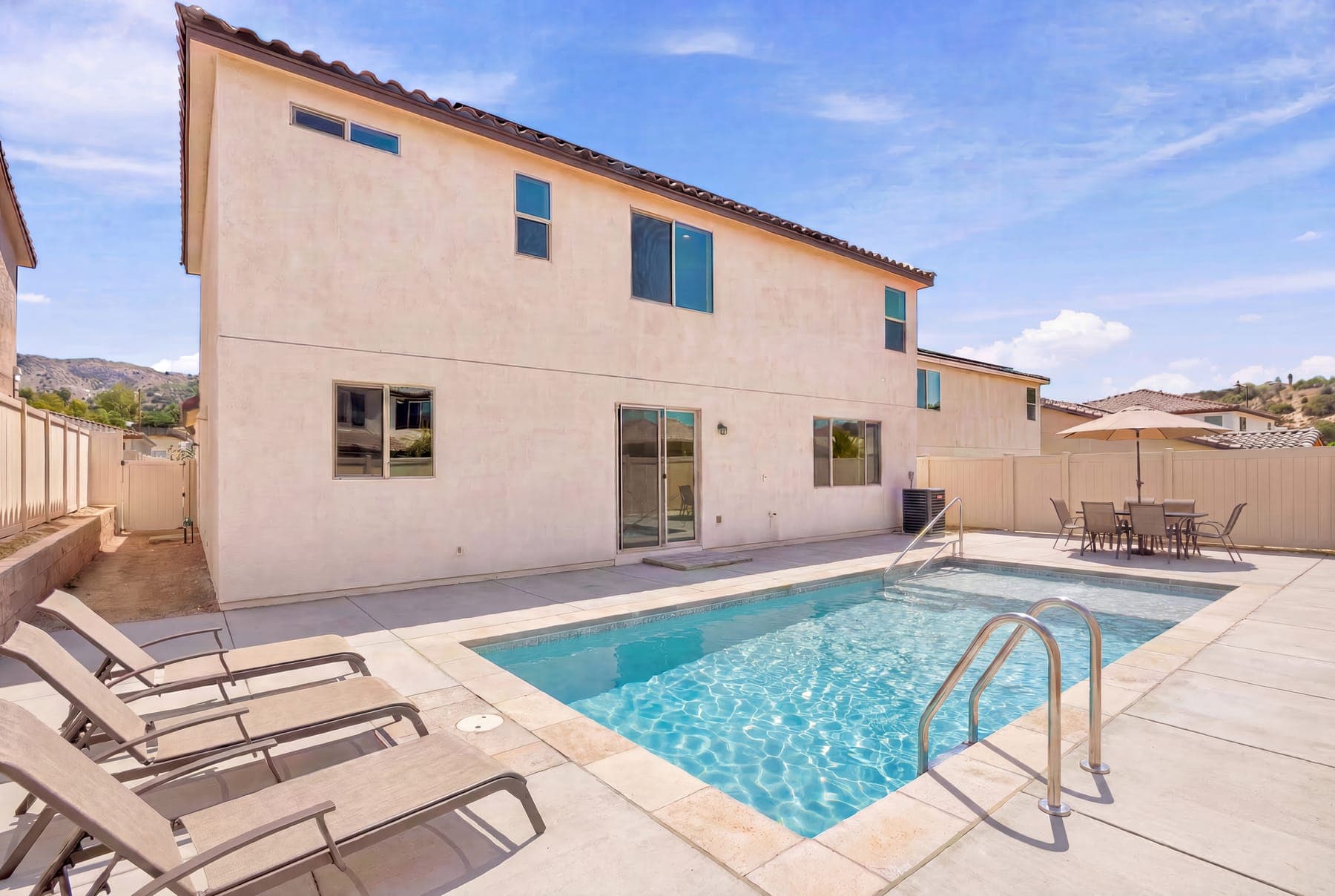Escondido backyard — dirt lot versus rendered pool and patio