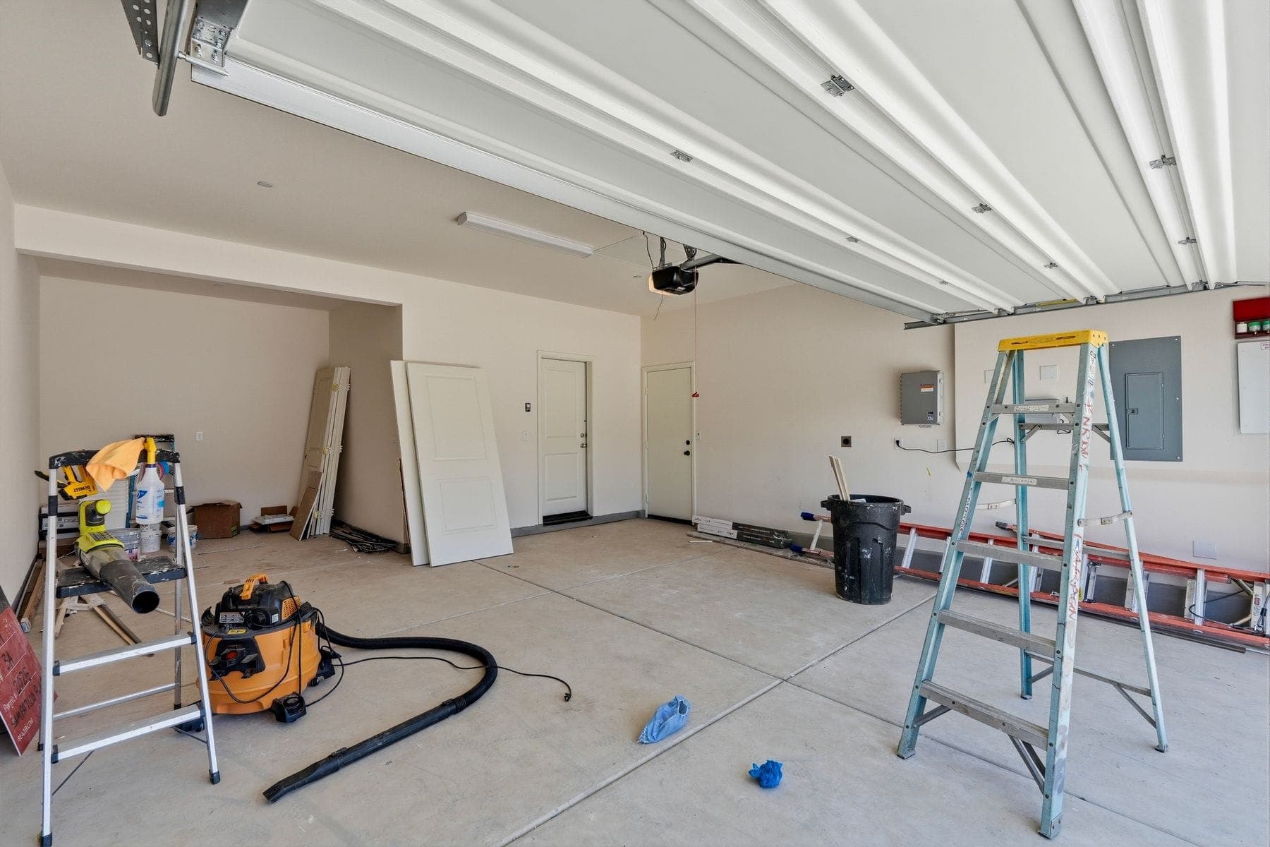 Escondido garage — cluttered versus decluttered